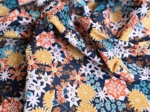 Tissu coton au mètre ex2405 fleurs étoilées marine