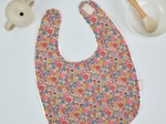 Bavoir tissu plastifié mille et une fleurs