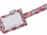 Etiquette bagage rouge corolle