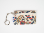 Pochette porte-clés plumes d'été