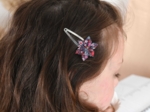 Barrette clic-clac fleur étoile romance fleurie