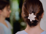 Barrette fleur étoile blanc pailleté